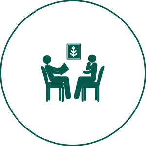 Two people sitting across a table.